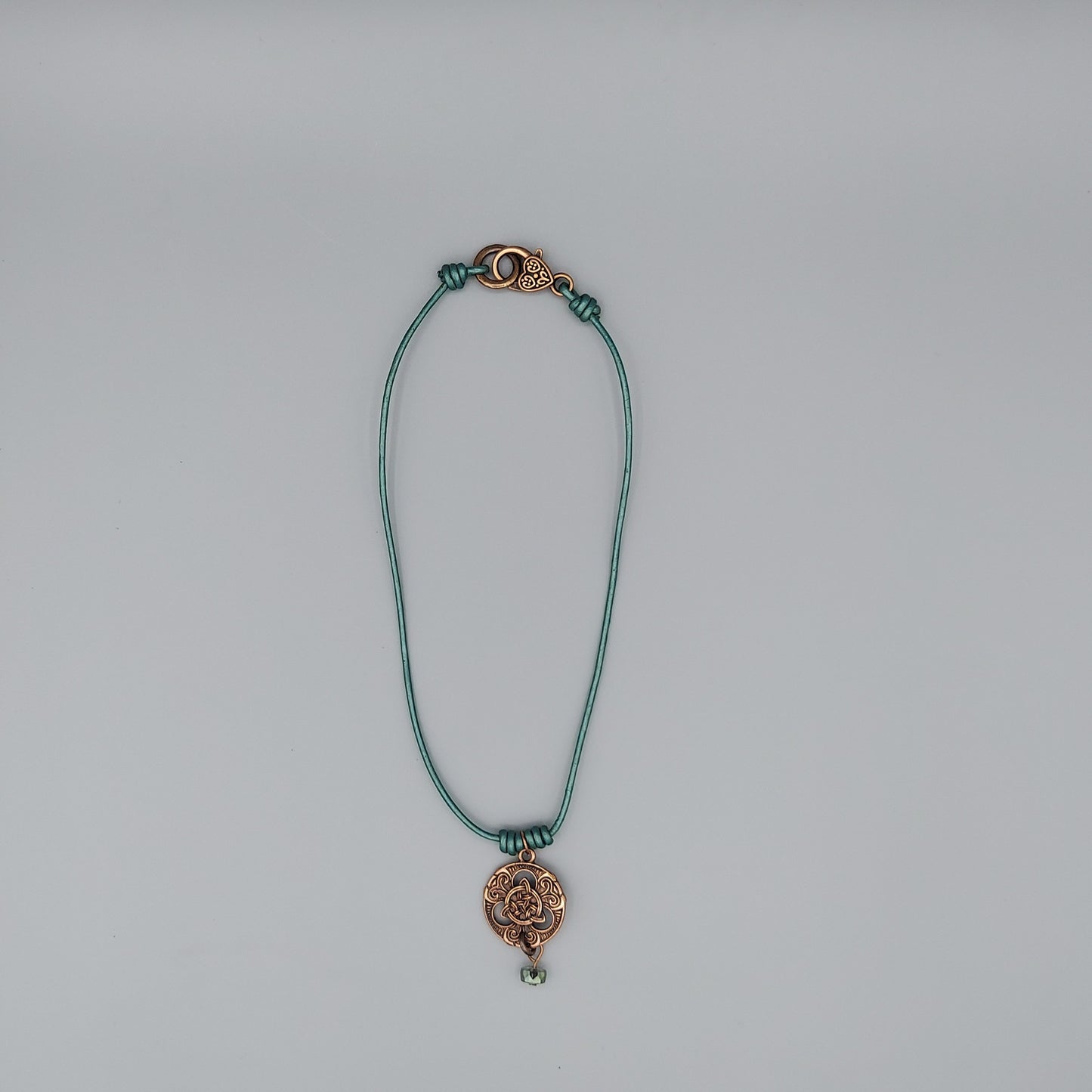 Copper Celtic Trinity Knot-Green Leather