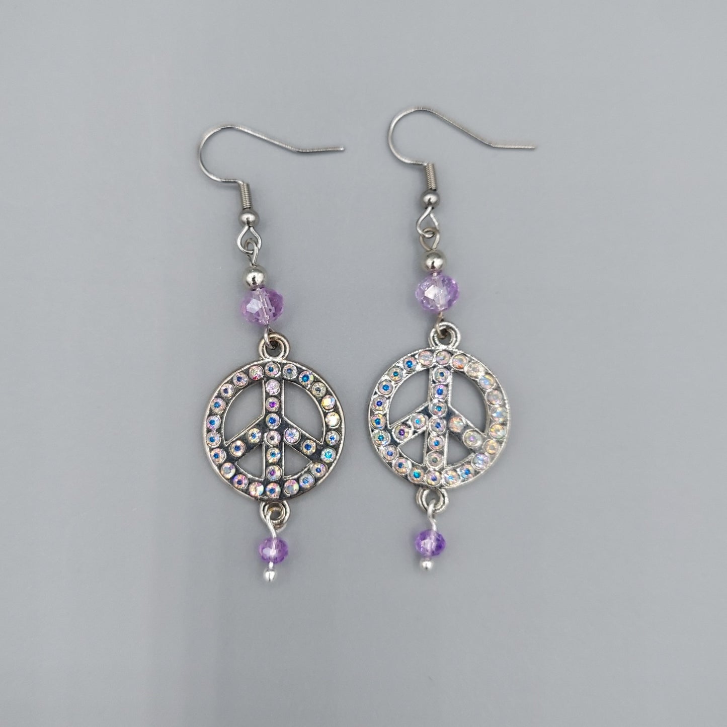Rhinestone Peace Sign Earrings/ Lt Purple Crystals