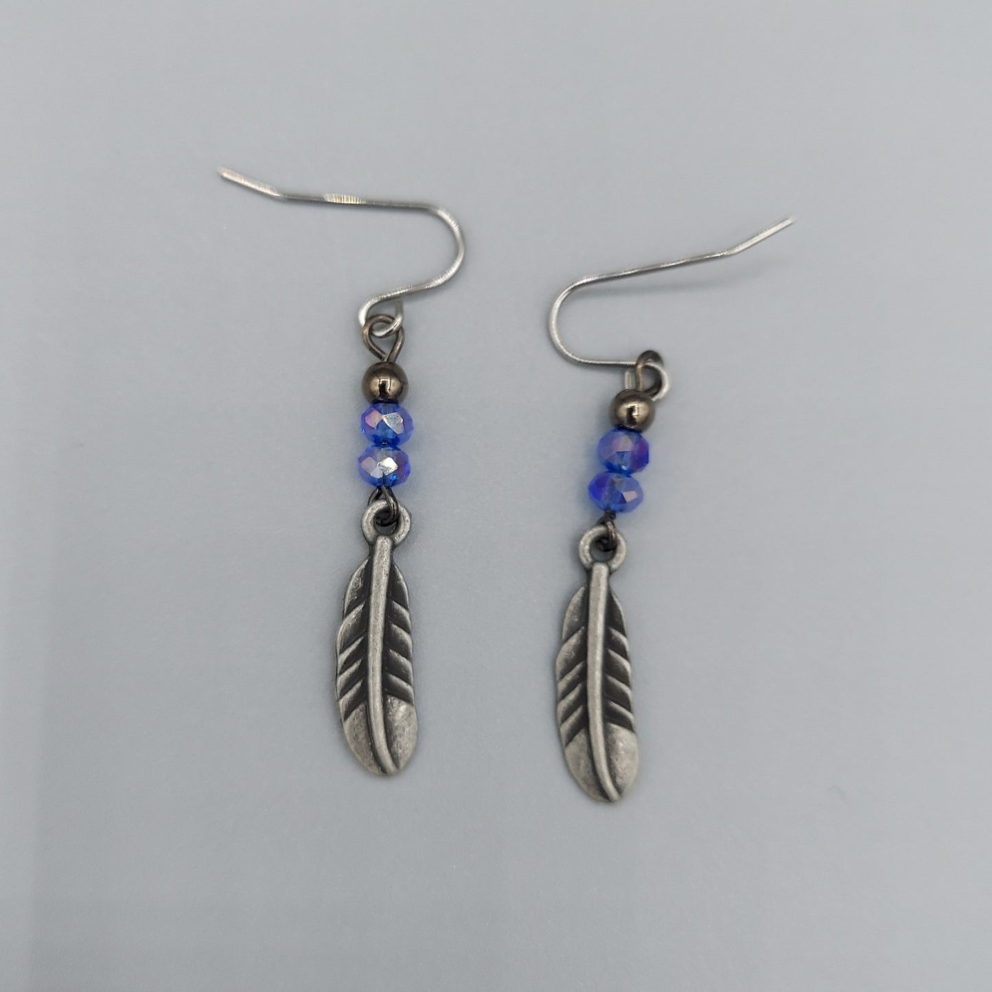 Pewter Feather Earrings/Royal Blue Crystals