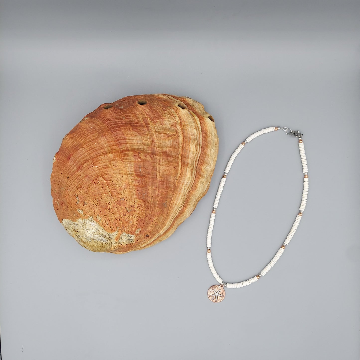 White Shell Necklace w/Copper Sand Dollar
