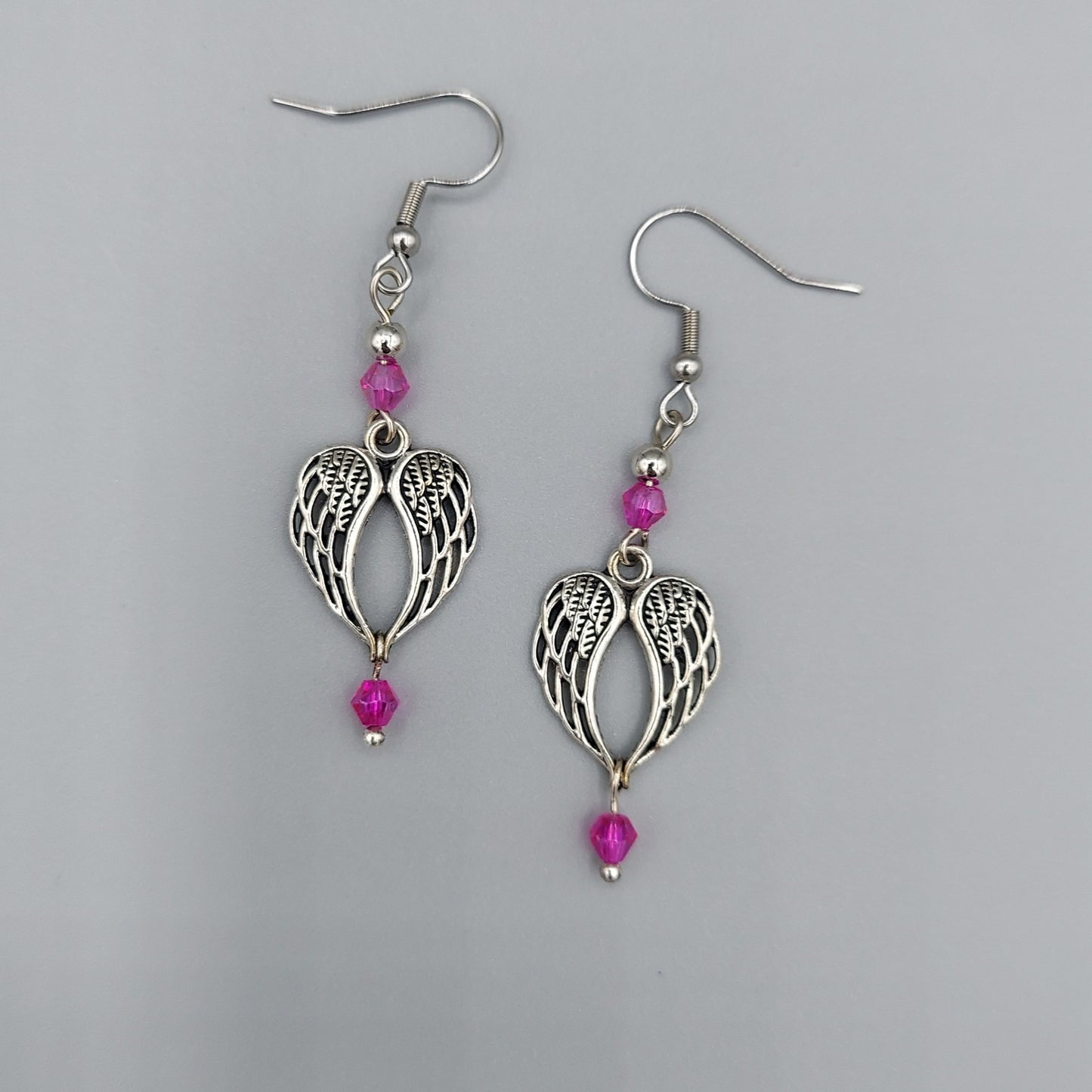 Silver Winged Earrings/Fuchsia Crystals
